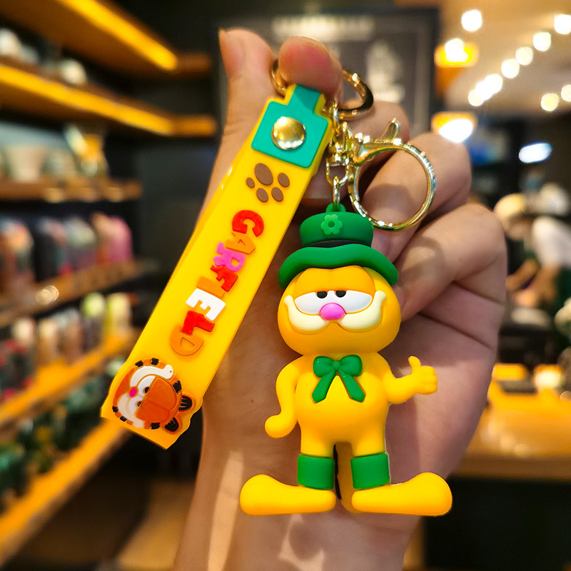 クリエイティブなガーフィールドキーホルダー漫画カーフィギュア - Car Accessories Wholesale のレビューと価格